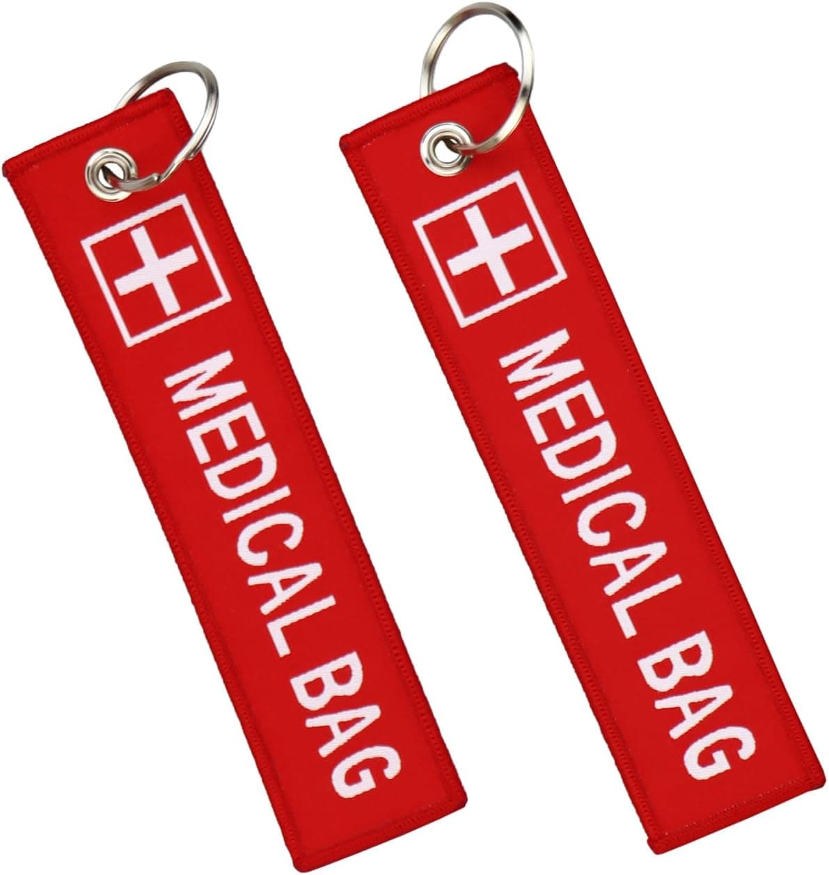 Two red luggage tags printed "MEDICAL BAG" with a white cross